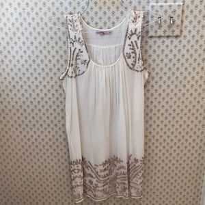 Calypso St. Barth’s white dress with gold beading